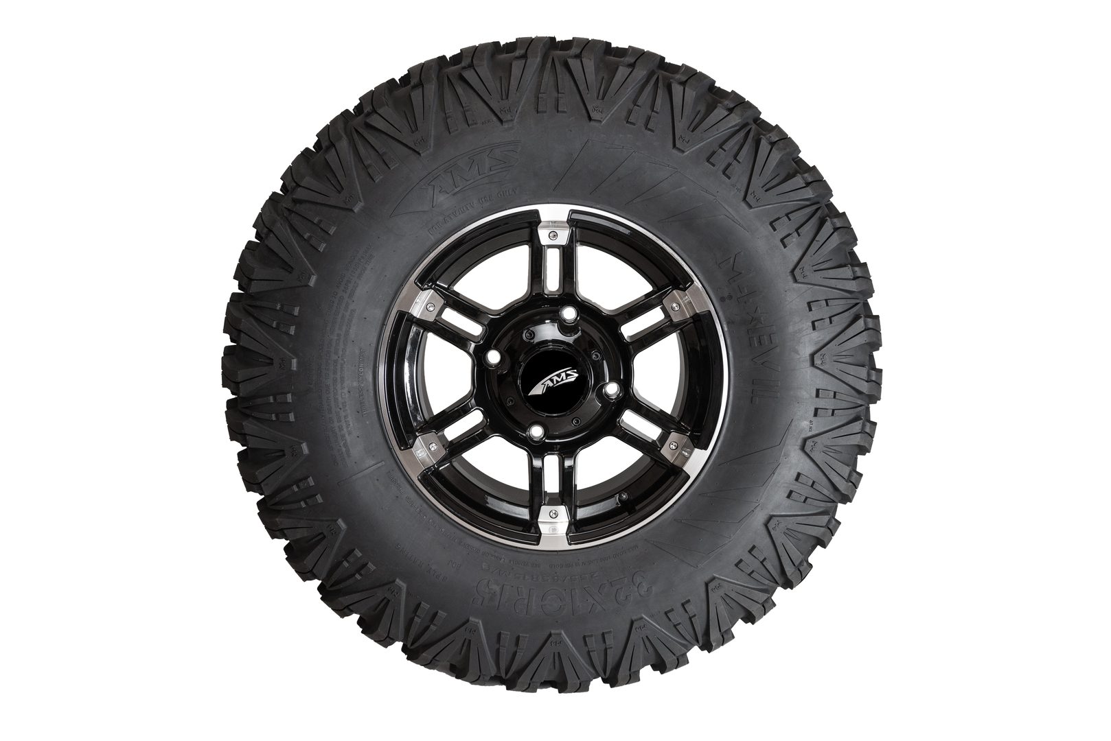 Black off-road tire mounted on a polished black and silver rim, isolated on a white background.